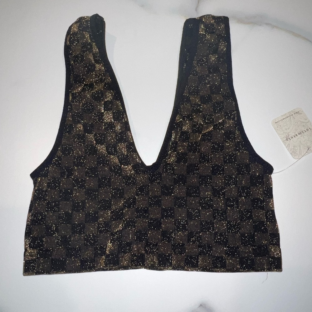 Brand new with tags!!! Sparky sexy fit! Goes well with any bottoms!